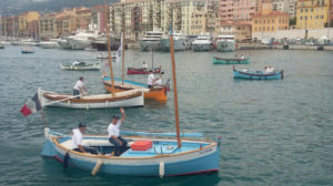 Parade of "pointus" fishing boats during the Nice Festival du Port 2018.