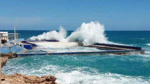 Storm waves washing into Sliema Pitch pool, Malta